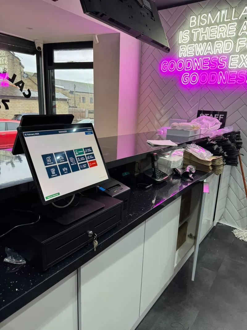 EPOS terminal and cash drawer on a counter